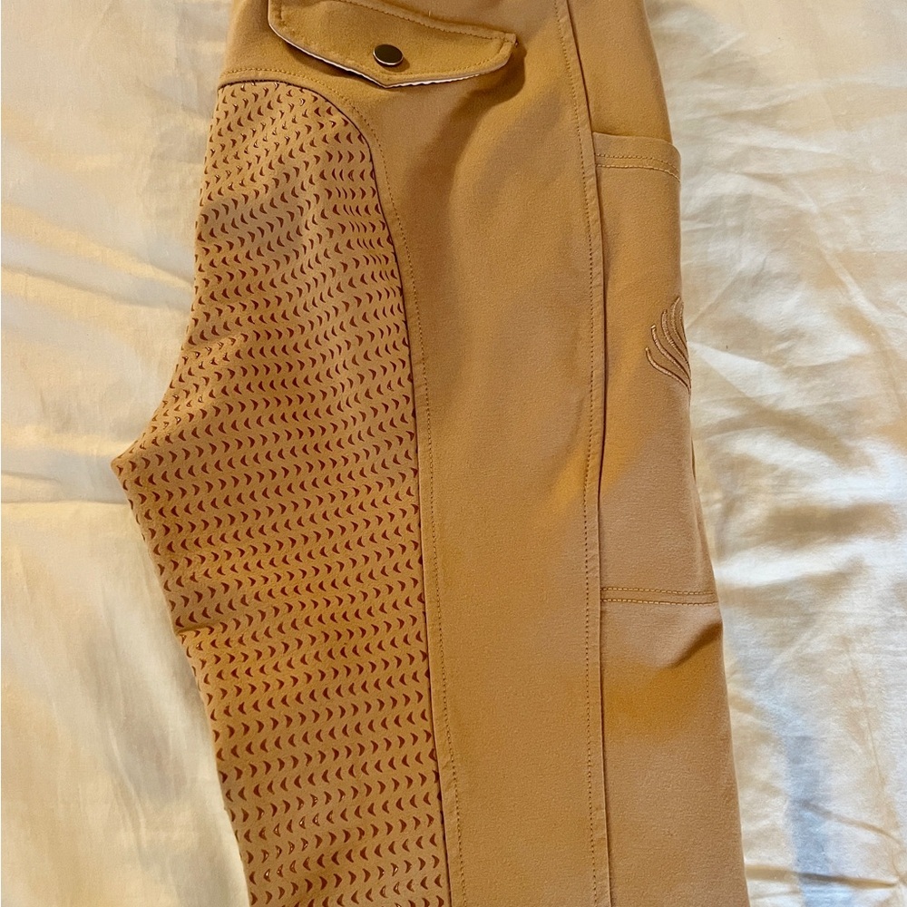 Classic tan Woman’s full seat riding breeches size 34.